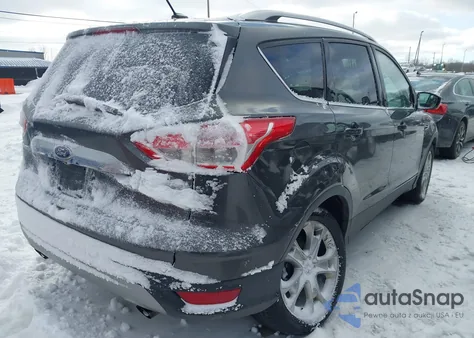 2015 Ford Escape Titanium z USA, uszkodzony, nr VIN 1FMCU9J98FUA88893